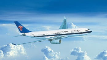 Chinese doctor uses makeshift catheter to save sick passenger's life during international flight: report