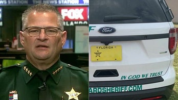 'We're standing by it': Sheriff doubles down on 'In God We Trust' decals after atheist group's complaint