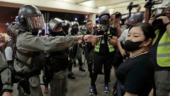 Hong Kong reinstates mask ban as police look to crack down on violence during elections