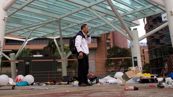 Hong Kong Polytechnic University standoff appears over as search yields only one protester