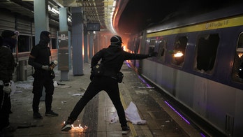 Hong Kong violence forces students to flee, city ‘slipping into the abyss of terrorism,’ Chinese officials say