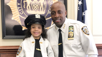 NY girl, 5, who survived suicidal dad's subway jump visits NYPD