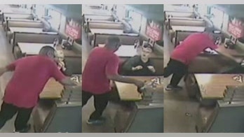 Man attacks IHOP customers with coffee pot in surveillance footage
