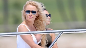 Pamela Anderson, 52, stuns in low-cut swimsuit on luxury yacht