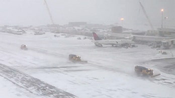 Snowstorm closes Denver airport, stranding Air Force Academy cadets