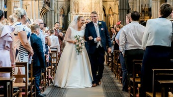 Bride who uses wheelchair shocks groom by walking down aisle on wedding day