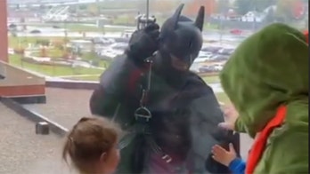 Toledo SWAT Unit's 'superheroes' pay Halloween visit to children's hospital