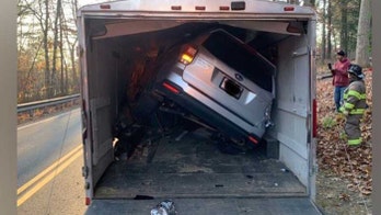 Massachusetts driver crashes SUV into trailer ... literally