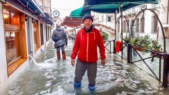 Venice flooding shocks couple hoping for romantic getaway; tourists say water 'had risen within 15 or 20 minutes'