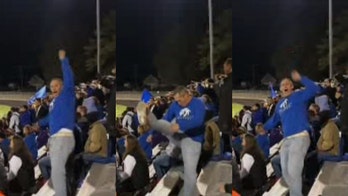 Virginia 'cheer dad' goes viral for football game performance: 'This guy is legit'