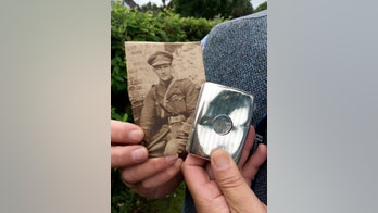 Miracle WWI silver cigarette case that stopped a bullet sells for thousands at auction