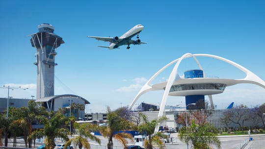 Plane departing LAX suffers engine failure, spews flames