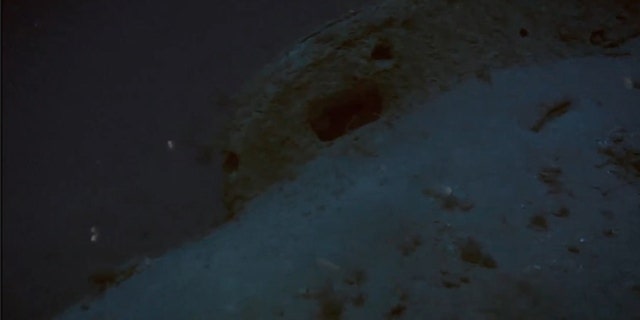 The submarine is resting in 427 feet of water.