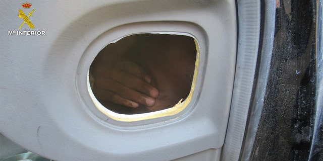 The hand of the 17-year-old migrant who was found hiding in the glove compartment of a Hyundai station wagon.
