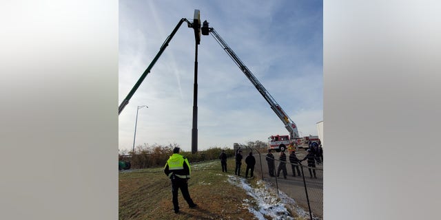 A man was performing maintenance on a McDonald’s sign when his lift broke, stranding him 100 feet in the air in below-freezing weather.