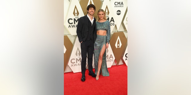 Kelsea Ballerini and husband Morgan Evans attend the 53rd Annual CMA Awards on Wednesday, Nov. 13, 2019 at Bridgestone Arena in Nashville.