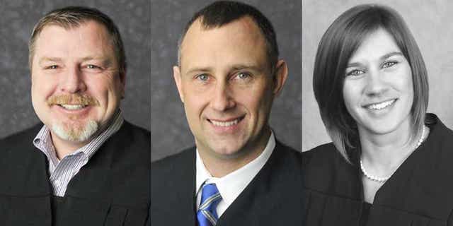 Judges Andrew Adams, left, Bradley Jacobs and Sabrina Bell have been suspended without pay, according to the Indiana Supreme Court. (Indiana Courts)