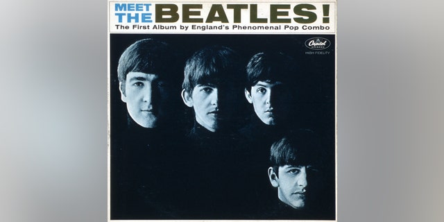 (L-R) John Lennon, George Harrison, Paul McCartney, Ringo Starr. Photographed by Robert Freeman