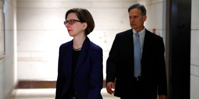 Deputy Assistant Secretary of Defense Laura Cooper, left, on Capitol Hill on Oct. 30. (AP Photo/Patrick Semansky, File)