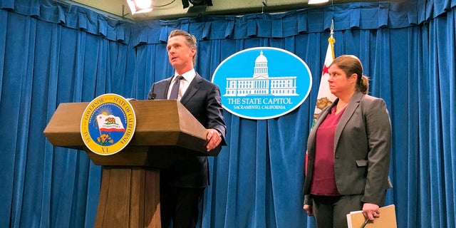 California Gov. Gavin Newsom announces the appointment of Ana Matosantos as California's "energy czar" on Friday. (AP Photo/Adam Beam)