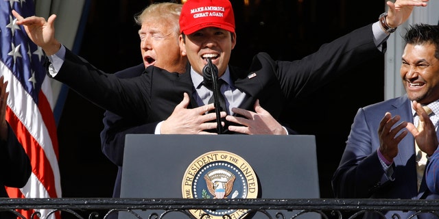 President Trump hugging Washington Nationals catcher Kurt Suzuki at the White House on Monday. (AP Photo/Patrick Semansky)