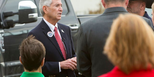 Eddie Rispone, speaking with supporters at in Lake Charles, La., on Monday. [Rick Hickman/American Press via AP)