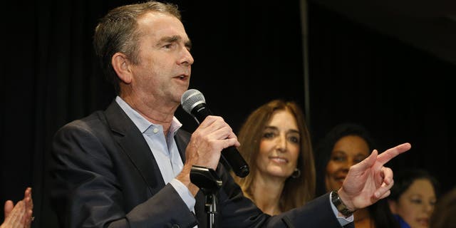 Virginia Gov. Ralph Northam speaks to supporters at a Democratic election party in Richmond, Va., Tuesday, Nov. 5, 2019. All seats in the Virginia House of Delegates and State Senate are up for election. (AP Photo/Steve Helber)