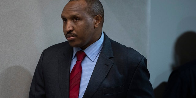 Congolese militia commander Bosco Ntaganda enters the courtroom of the International Criminal Court, or ICC, to hear the sentence in his trial in The Hague, Netherlands, Thursday, Nov. 7, 2019. (AP Photo/Peter Dejong, Pool)