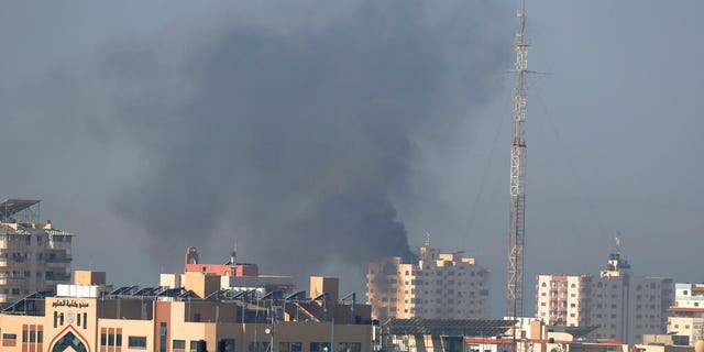 Nov. 12: Smoke rises after an Israeli forces strike in Gaza City. Israel killed a senior Islamic Jihad commander in Gaza early Tuesday in a resumption of pinpointed targeting that threatens a fierce round of cross-border violence with Palestinian militants. (AP Photo/Hatem Moussa)