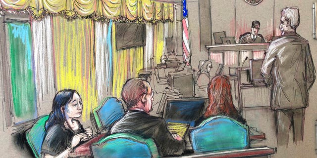 FILE: Yujing Zhang, left, listens to a hearing in West Palm Beach, Fla. this past April.