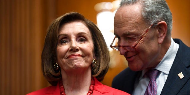 House Speaker Nancy Pelosi of Calif., left, and Senate Minority Leader Sen. Chuck Schumer of N.Y., 