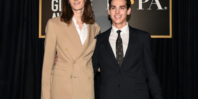 Paris Brosnan, right, and Dylan Brosnan attend the Hollywood Foreign Press Association and The Hollywood Reporter celebration of the 2020 award season and Golden Globe Ambassador reveal at Catch LA on Thursday, Nov. 14, 2019, in West Hollywood, Calif.