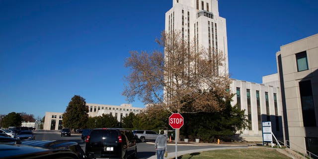 Trump's motorcade waits at Walter Reed National Military Medical Center in Bethesda, Md. Saturday. (Associated Press)