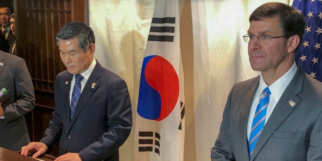 U.S. Defense Secretary Mark Esper, right, and South Korea defense Minister Jeong Kyeong-doo address reporters in Bangkok, Thailand, Sunday, Nov. 17, 2019. Esper and his South Korean counterpart announced Sunday that U.S. and South Korea are postponing a joint military air exercise that North Korea has criticized as provocative. (Associated Press)