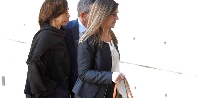 Former Baltimore mayor Catherine Pugh, left, arriving at U.S. District Court in Baltimore on Thursday.