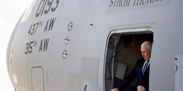 Vice President Mike Pence arrives at Al Asad Air Base, Iraq, Saturday, Nov. 23, 2019. The visit is Pence’s first to Iraq and comes nearly one year since President Donald Trump’s surprise visit to the country. (AP Photo/Andrew Harnik)