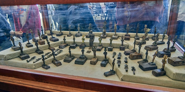 73 bronze statuettes depicting god Osiris are displayed in Saqqara, south Giza, Egypt. Saturday, Nov. 23, 2019. (AP Photo/Hamada Elrasam)