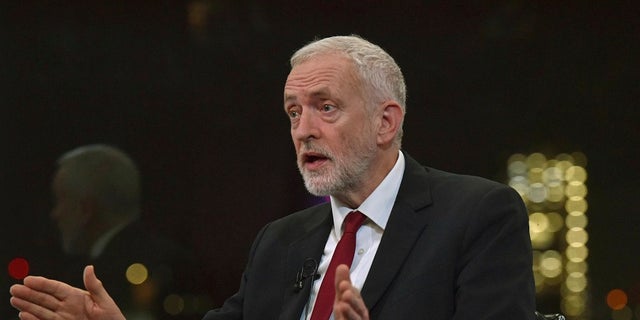 Britain's Labour Party leader Jeremy Corbyn speaks during a BBC interview in London on Tuesday. Corbyn and his party have been deeply tarnished by anti-Semitism accusations, as the UK prepares to go to the polls in a General Election on Dec. 12. (Jeff Overs/BBC via AP)