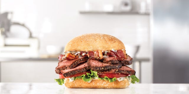 Both sandwiches will feature thick-cut petite filet steak seasoned with black pepper and slow-cooked to medium, on a ciabatta roll.