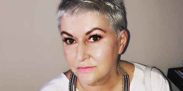 Addelaid Ann Ferreira-Watt died Monday after a gun brought inside a courtroom accidentally discharged, a report says.