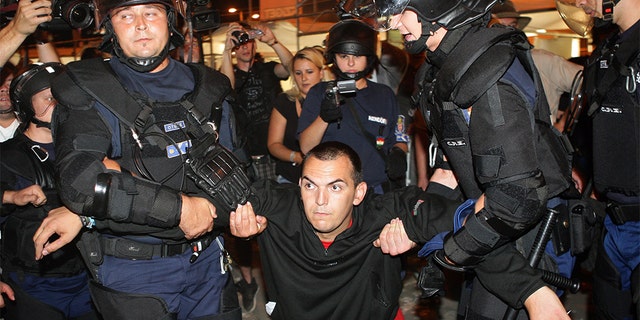 Hungary's police detained Gyula Zagyva, representative of the far right Jobbik party, in the Hungarian Parliament August 12, 2011. Zagyva had protested against the international rock fesztival Sziget, joining the another far right movenment that used anti-Semitic slurs against the festival.