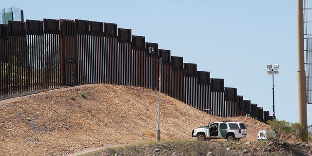 A border fence in Nogales, Ariz.  A Border agent shot a Russian citizen allegedly attempting to cross the US-Mexico border in Arizona on Thursday.