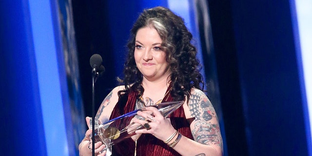 Ashley McBryde accepts an award onstage during the 53rd annual CMA Awards at the Bridgestone Arena on November 13, 2019 in Nashville, Tennessee. (Photo by Terry Wyatt/Getty Images,)