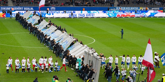 The ceremony marked 30 years after the fall of the Berlin Wall. (Soeren Stache/dpa via AP)