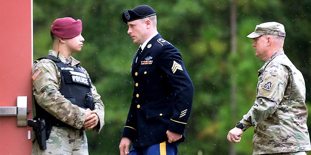 U.S. Army Sgt. Robert Bowdrie "Bowe" Bergdahl is escorted to the Ft. Bragg military courthouse following a lunch recess after pleading guilty to desertion and misbehavior before the enemy on October 16, 2017 in Fort Bragg, North Carolina. An appeals court will review his case to determine whether comments made by President Trump or others led to an unfair trial.<br>
(Photo by Sara D. Davis/Getty Images)