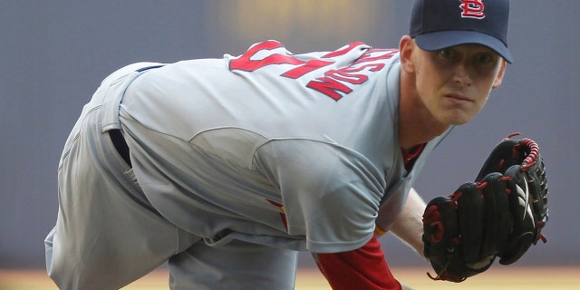 File-This Sept. 1, 2011, file photo shows St. Louis Cardinals pitcher Brandon Dickson throwing during the first inning of a baseball game against the Milwaukee Brewers, in Milwaukee. Dickson, the U.S. closer who blew a ninth-inning lead, threw his last major league pitch in 2012. (AP Photo/Jeffrey Phelps, File)