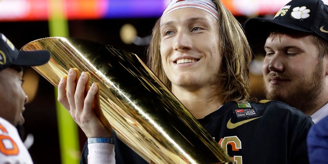 Trevor Lawrence can't jump to the NFL just yet. (AP Photo/David J. Phillip, File)