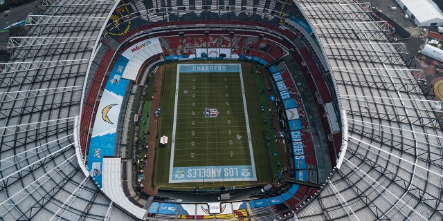 An aerial view of the Azteca Stadium in Mexico City, Saturday, Nov. 16, 2019, where the Kansas City Chiefs and Los Angeles Rams will face off for a regular-season Monday Night Football game. Heavy rain and heavy use last year left the grass unfit for the AFC matchup, forcing the Chiefs-Rams game to be relocated to Los Angeles. (AP Photo/Christian Palma)