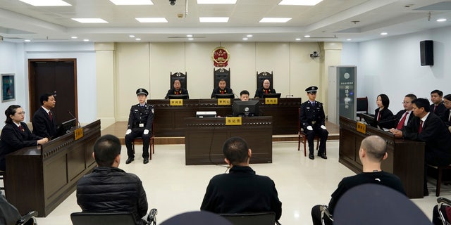 A trial continues as fentanyl drug traffickers are sentenced in court, Thursday, Nov. 7, 2019, in Xingtai, north China's Hebei Province.