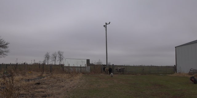 Outside Ethan Vorhes' farm in Iowa where he grows soybeans and corn, and raises cattle.